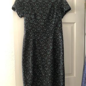 Maggie London Dark blue / patterned cocktail dress. off set square neck